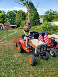 10-Year-Old on a Mower Parade